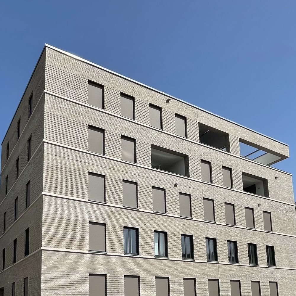 Wohngebäude in Ulm mit Wasserstrich-Verblend-Ziegel und Riemchen von FaBö