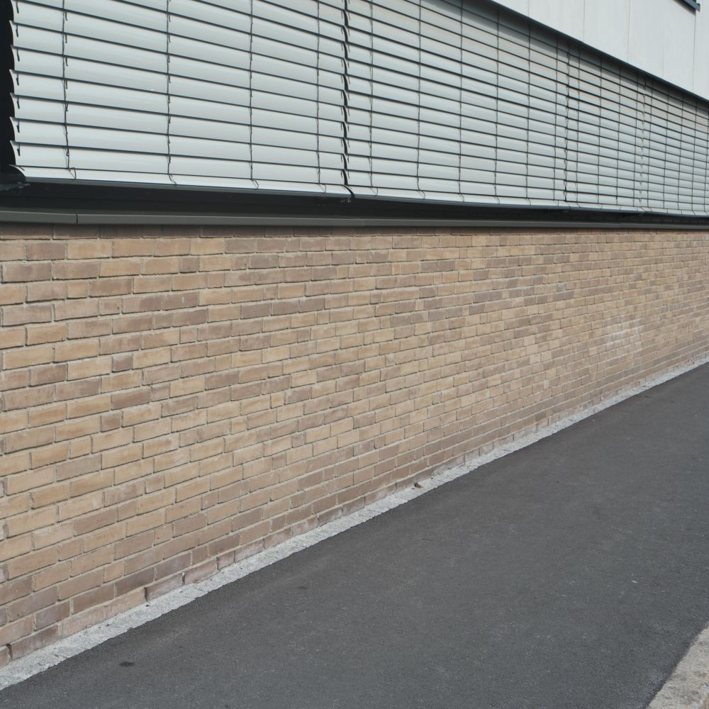 Gemeinschaftshaus Vorkloster in Bregenz mit Wasserstrich-Verblend-Ziegel von FaBö