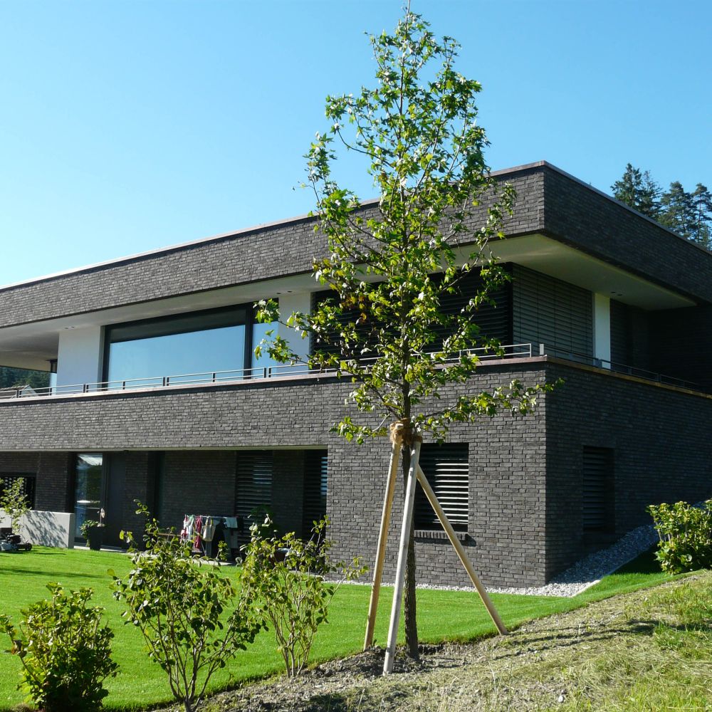 Wohnhaus in Röthis mit Handform-Verblend-Ziegel von FaBö